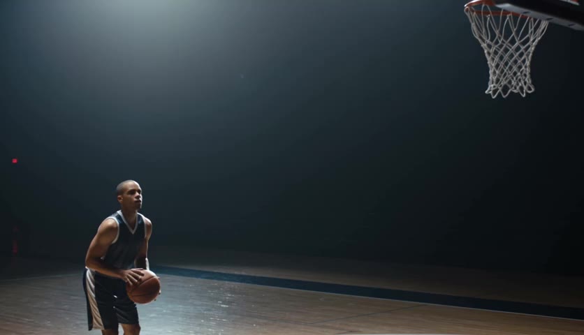 Basketball player shooting a swish at the hoop